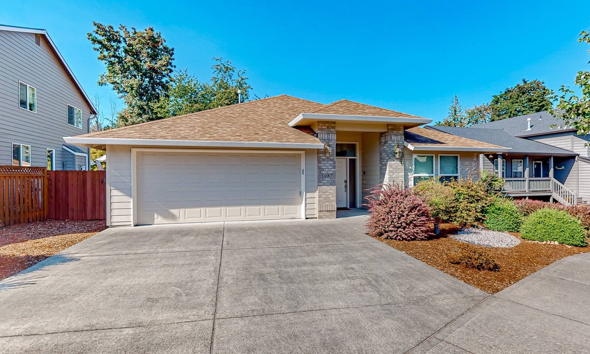 Gresham House | Custom-built home alongside greenspace with deck & massage chairs