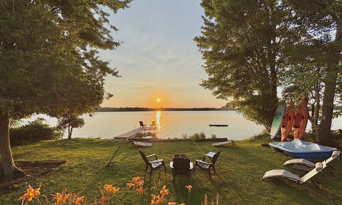 Stone Mills Cottage | Modern, Sunset-Facing Waterfront Cottage