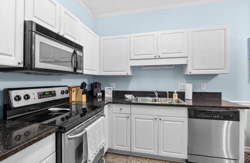 Vaught Apartment | A wave from it all < 1 mile to the beach!