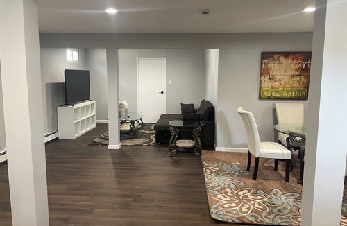 Old Bethpage House | Abundant space with a full kitchen next to trails and golfing