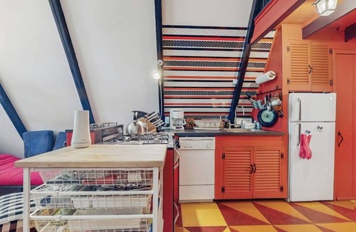 West Townshend House | Charming gingerbread A-frame situated on 3 acres, woodstove, A/C, deck