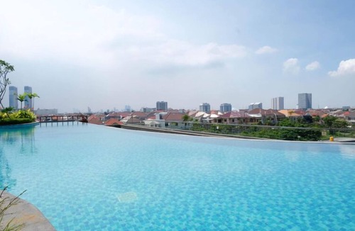 Surabaya Apartment | Comfy Modern Look Studio Room At Apartment Grand Dharmahusada Lagoon