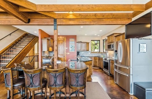 Laclede House | Custom riverfront home with private dock, game room, hot tub & heated floors