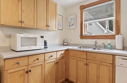 Ogunquit Condo | High Tide Cottage is located in town and just steps from Ogunquit Beach!