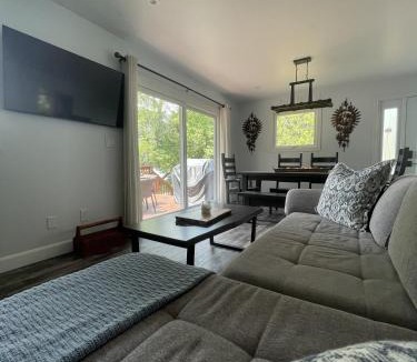 Colebrook House | Modern, Sunset Waterfront Cottage with EV Charger