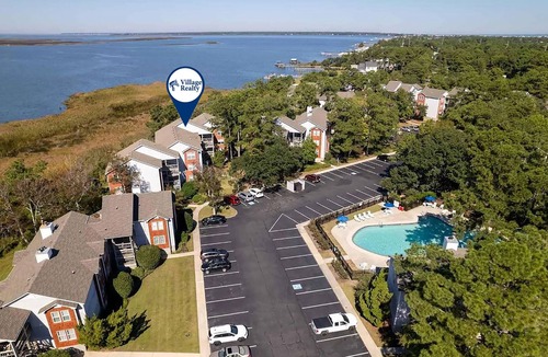 Colington Condo | Oyster Pointe E3: Soundfront | Shared Pool, Tennis