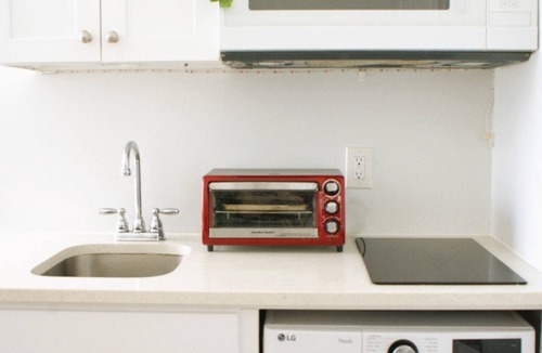 Queens Apartment | Serene Studio in Flushing on Main St with Free On-Site Parking and Laundry