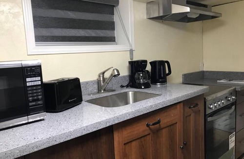 The Queensway House | Spacious 2BR Basement Suite - Mins to Downtown