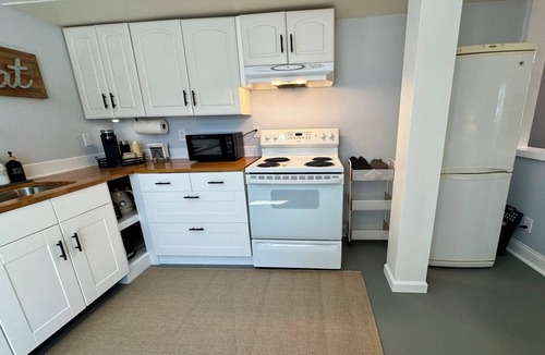 Loyal Heights Apartment | Spacious Studio Apt: King bed~Kitchen~in quiet N. Ballard~5 minutes to beach!