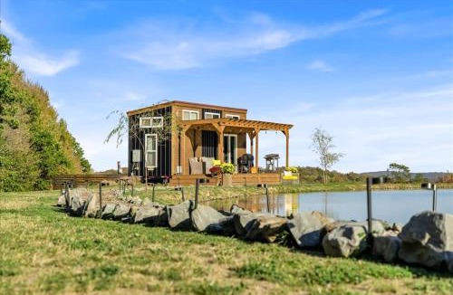 Brackney House | Tiny House On a Tiny Lake Porch at Waters Edge