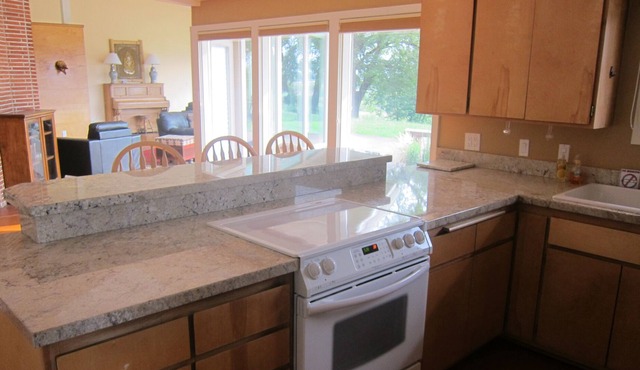 4 Bed / 2 Bath home on acreage, close to town, but with a country feel.
