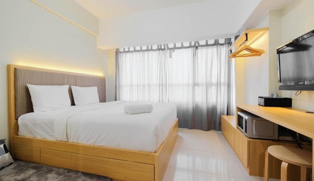 Modern Studio @ Springlake Summarecon Apartment By Travelio