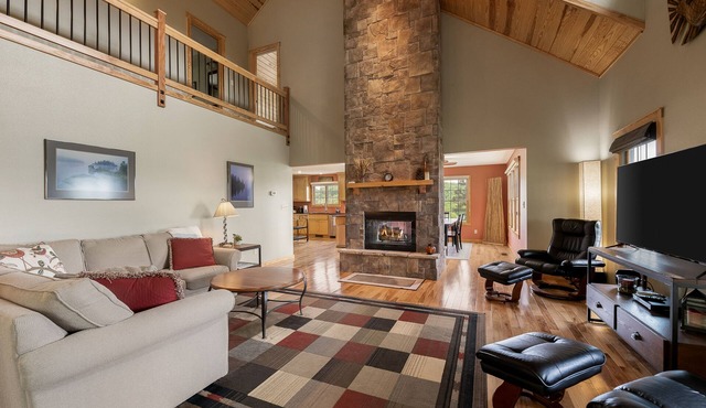 Multi-level home with a game room, washer/dryer, fireplace, deck & central AC
